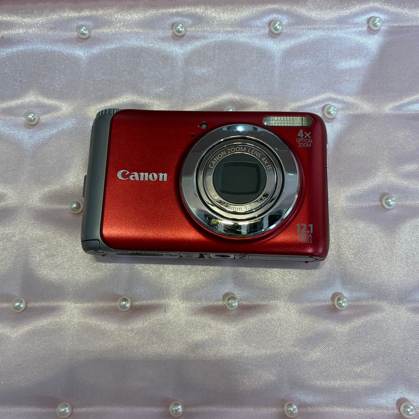 Canon Powershot A3100is in red
